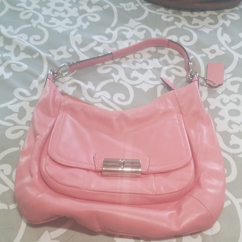 Smaller pink coach handbag